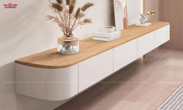 Kệ tivi treo tường được gắn trực tiếp vào tường giúp tiết kiệm diện tích sàn